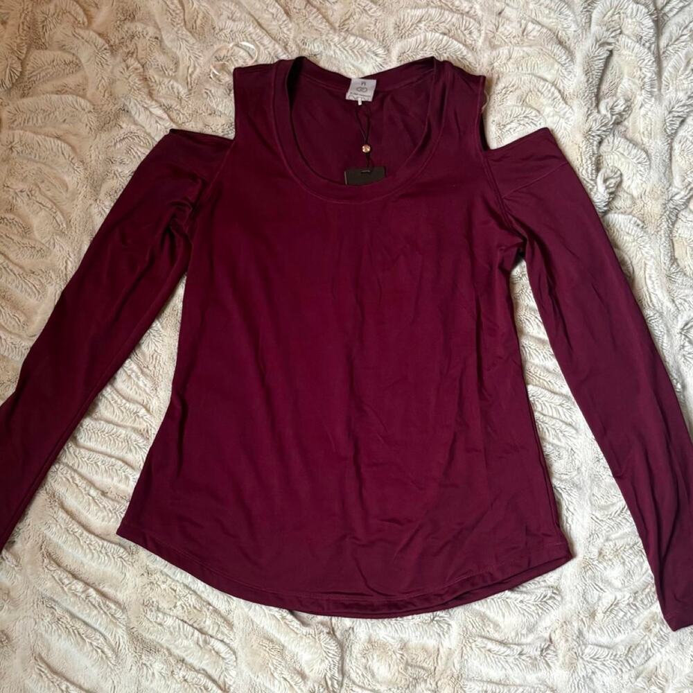 Burgundy long sleeve top with cut out shoulders, size M
